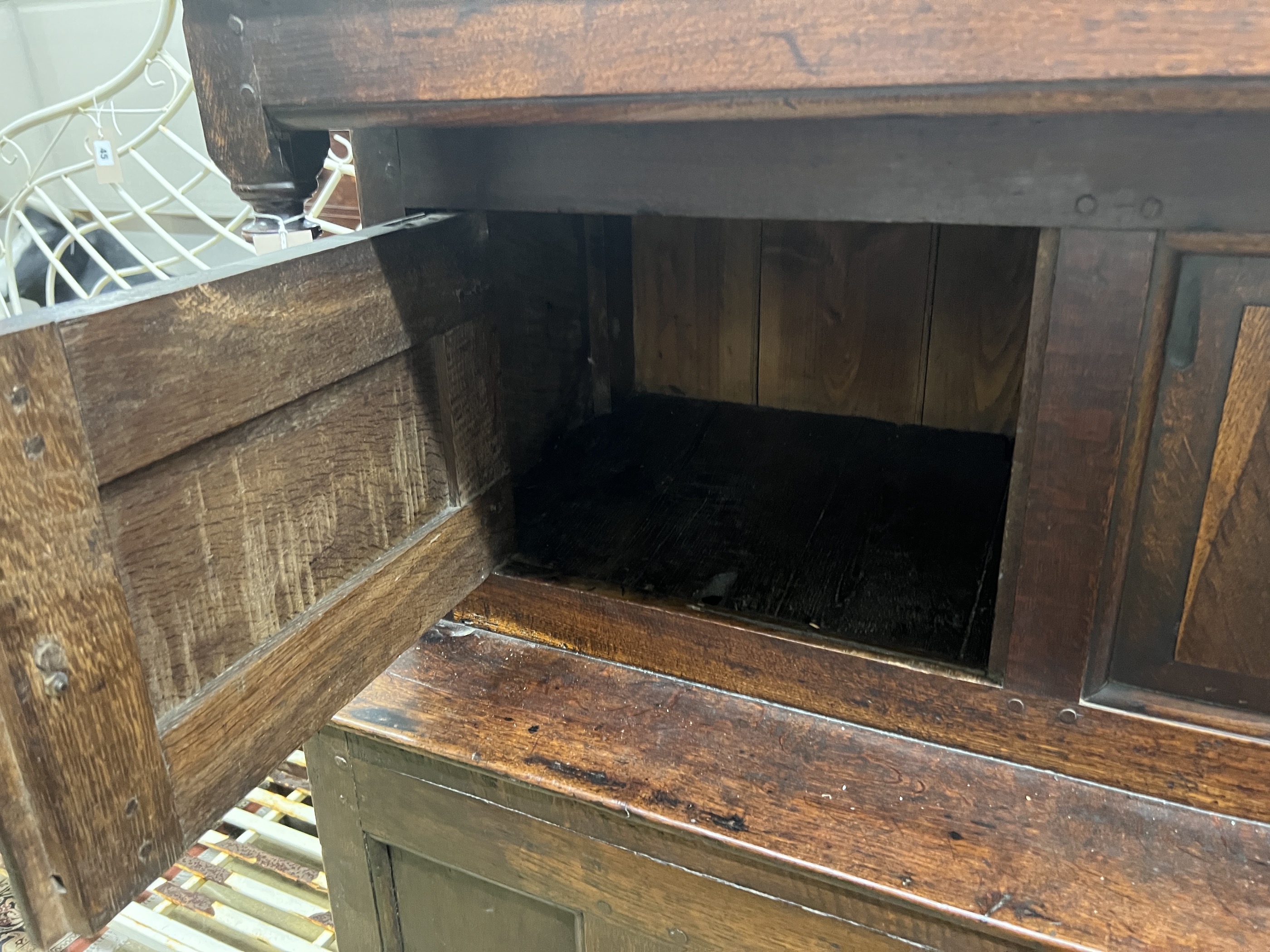 An 18th century oak court cupboard, width 124cm, depth 54cm, height 148cm